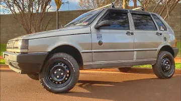 Uno com kit lift suspensão e Pneu 175/70 R14